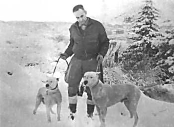 1950's, Dr. Augustin Nores Martinez with dogs Kob and Chaira